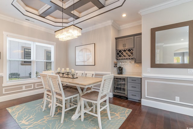 dining room featuring beam ceiling, ornamental molding, beverage cooler, and coffered ceiling