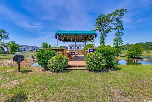 exterior space with a deck with water view