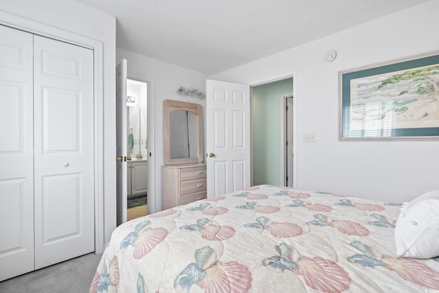 carpeted bedroom with a closet