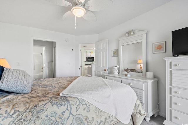 bedroom with ceiling fan and ensuite bathroom