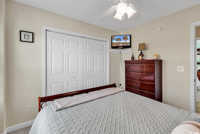 bedroom with a closet and ceiling fan