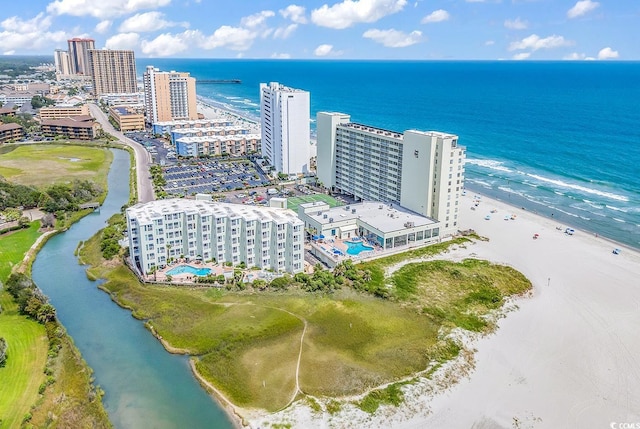 aerial view featuring a water view and a beach view