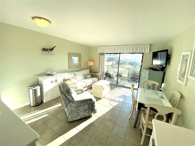 living room featuring light tile patterned flooring