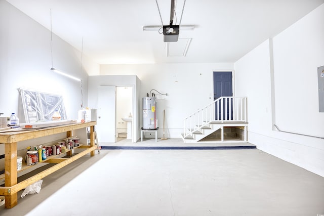 garage featuring a garage door opener and electric water heater