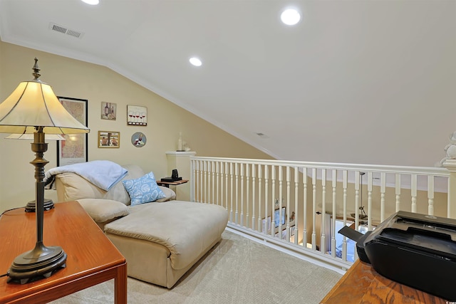 living area with light carpet and vaulted ceiling