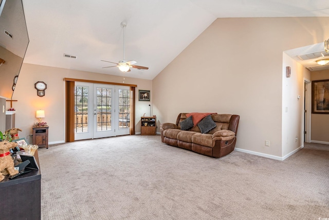 living room with carpet flooring, ceiling fan, and lofted ceiling