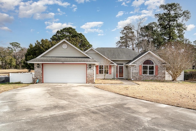 ranch-style house featuring a garage