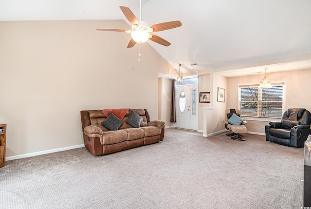 living room with carpet flooring, ceiling fan with notable chandelier, and lofted ceiling