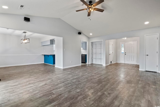 unfurnished living room with dark wood-style floors, lofted ceiling, visible vents, a ceiling fan, and baseboards