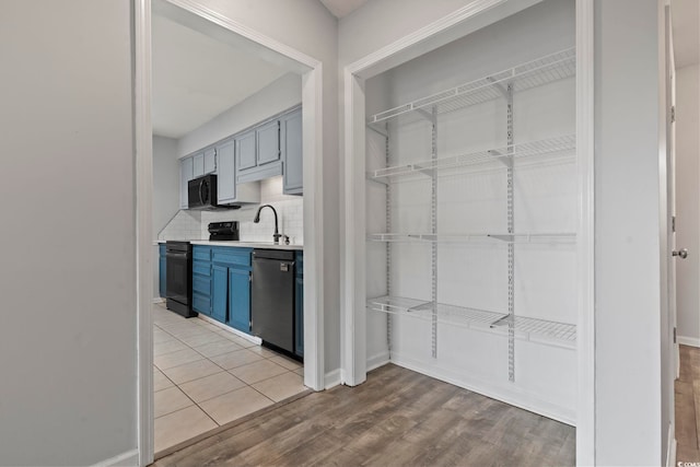 pantry with a sink