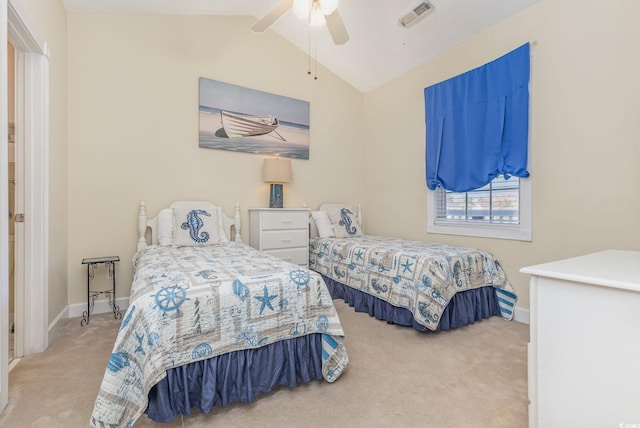 bedroom with ceiling fan, light colored carpet, and lofted ceiling