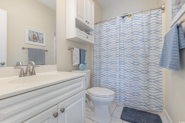 bathroom with tile patterned floors, vanity, toilet, and a shower with curtain