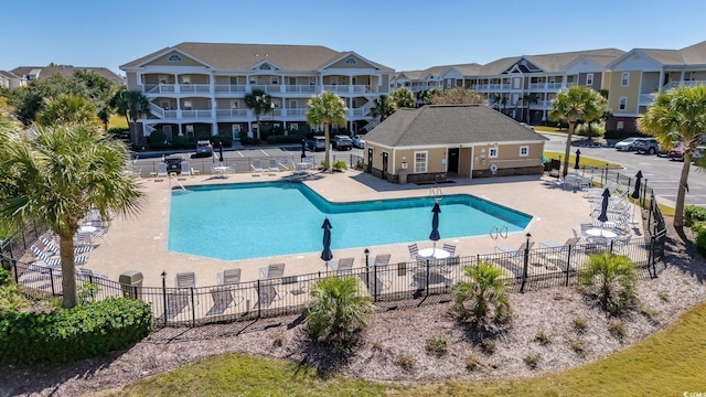 view of swimming pool featuring a patio area