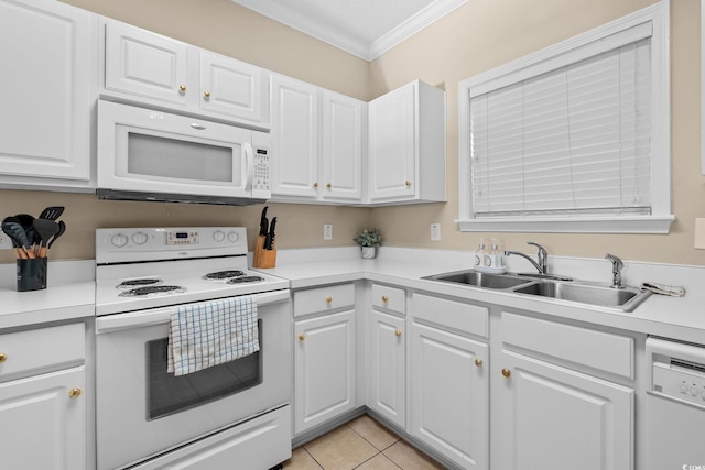 kitchen featuring white cabinetry, sink, crown molding, white appliances, and light tile patterned floors