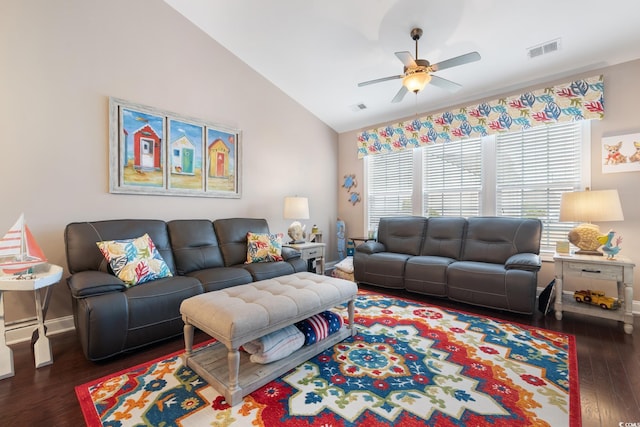 living room with ceiling fan, dark wood-type flooring, and lofted ceiling