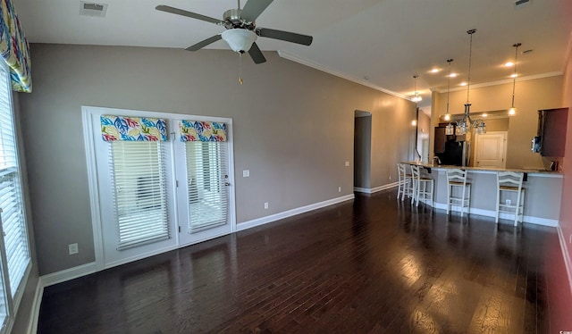 135 Parmelee Dr Unit D, Murrells Inlet, SC 29576 - kitchen featuring freestanding refrigerator, a kitchen bar, dark wood-style flooring, baseboards, and ceiling fan