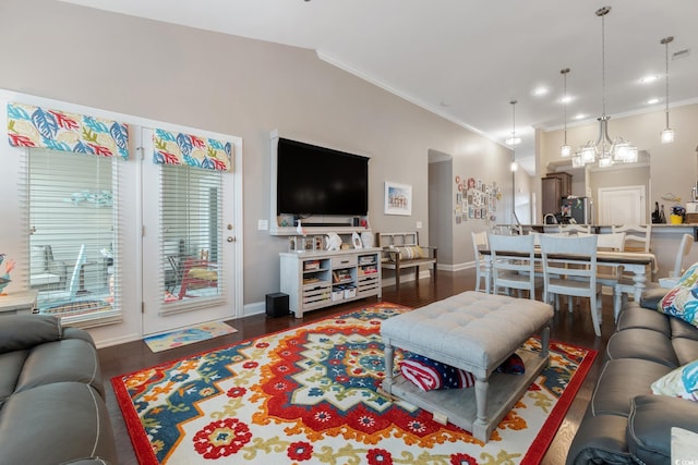 living room featuring dark hardwood / wood-style flooring and crown molding