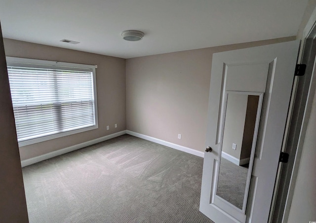 135 Parmelee Dr Unit D, Murrells Inlet, SC 29576 - spare room with carpet floors and baseboards