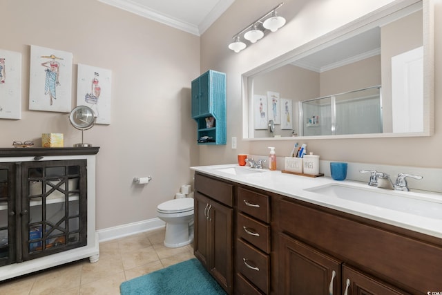 bathroom featuring tile patterned floors, toilet, a shower with door, vanity, and ornamental molding