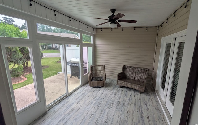 135 Parmelee Dr Unit D, Murrells Inlet, SC 29576 - sunroom / solarium featuring rail lighting and ceiling fan