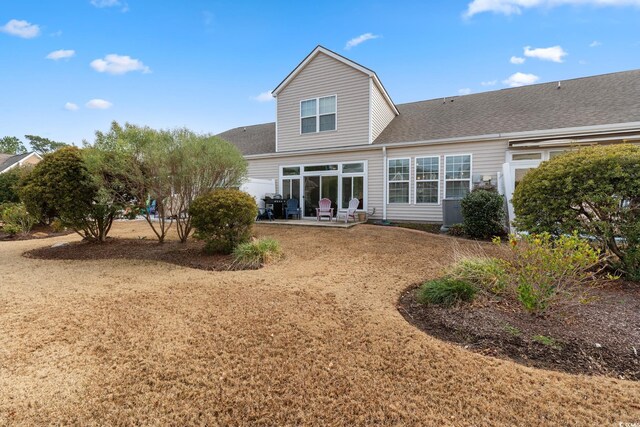 135 Parmelee Dr Unit D, Murrells Inlet, SC 29576 - back of house featuring a patio area and a shingled roof
