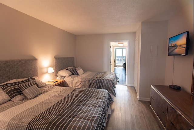 bedroom featuring hardwood / wood-style floors