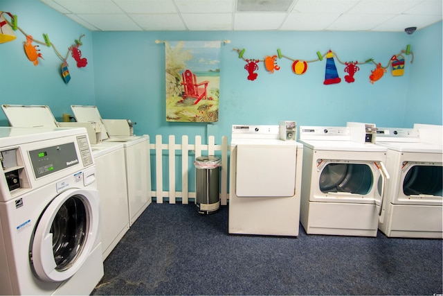 laundry area featuring dark carpet and independent washer and dryer