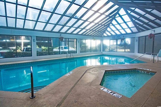 view of swimming pool featuring an indoor in ground hot tub