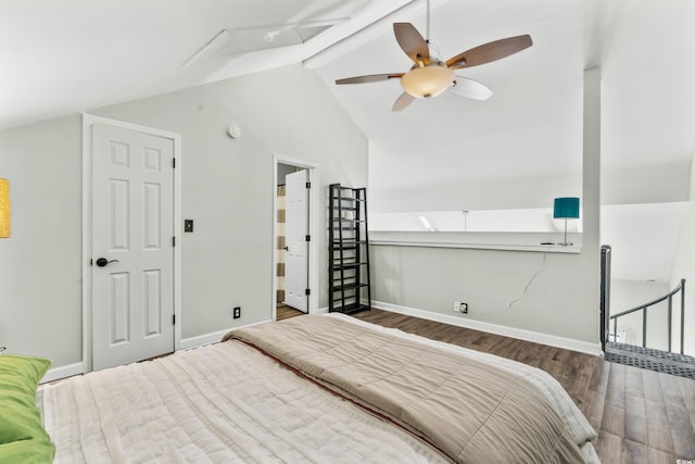 bedroom featuring ceiling fan, dark wood-type flooring, and lofted ceiling with beams