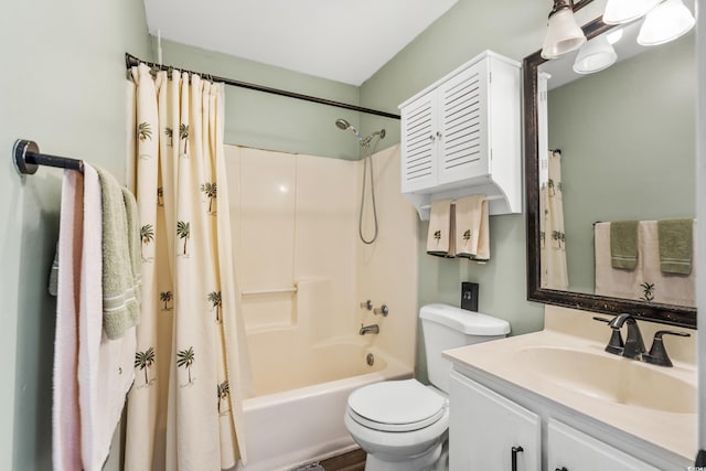 full bathroom featuring shower / bath combo, toilet, and vanity