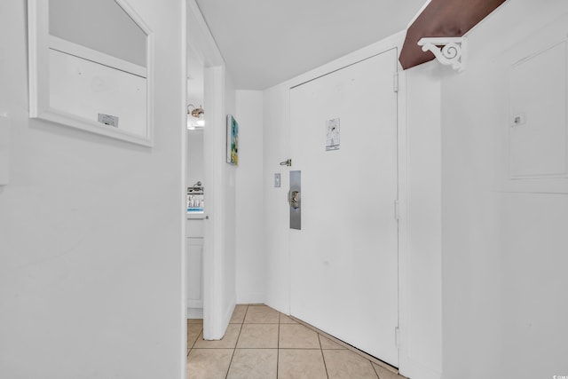 bathroom with tile patterned flooring