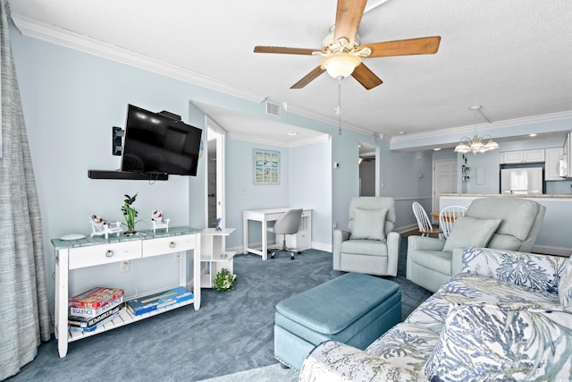 living room with a textured ceiling, ceiling fan with notable chandelier, dark carpet, and ornamental molding