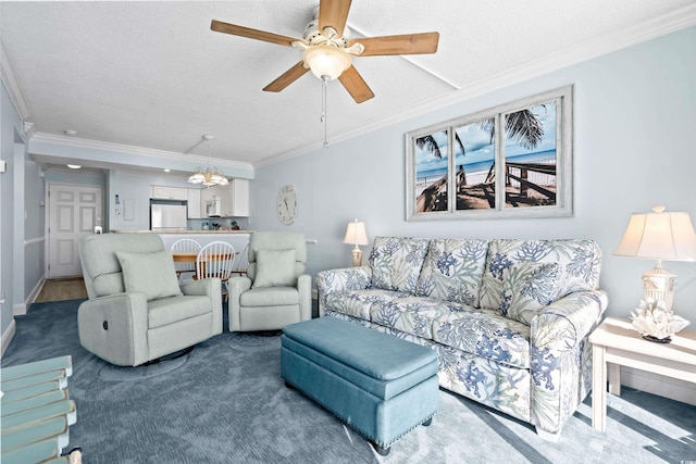 carpeted living room featuring a textured ceiling, ceiling fan with notable chandelier, and crown molding