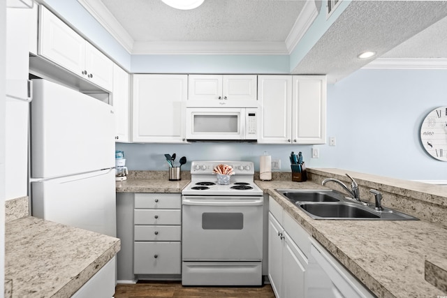 kitchen with a textured ceiling, sink, white cabinets, and white appliances