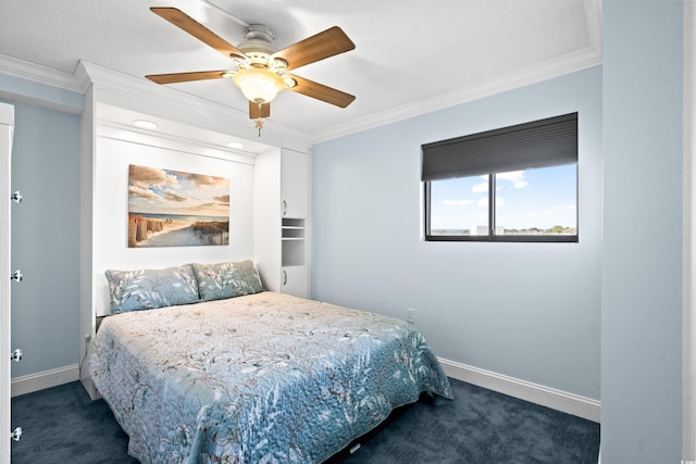 carpeted bedroom featuring ceiling fan and crown molding