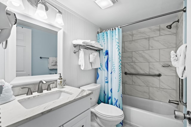 full bathroom featuring vanity, shower / bathtub combination with curtain, and toilet