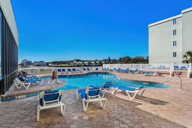 view of swimming pool featuring a patio