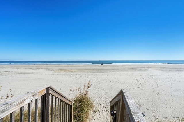 property view of water with a beach view