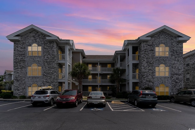 view of outdoor building at dusk