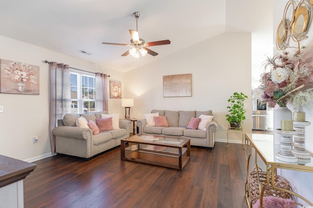 living room with dark hardwood / wood-style flooring, vaulted ceiling, and ceiling fan