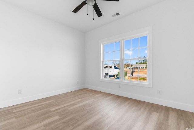 unfurnished room featuring ceiling fan and light wood-type flooring