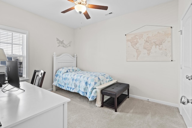 carpeted bedroom featuring ceiling fan