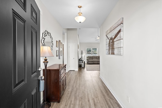 hallway featuring light hardwood / wood-style floors