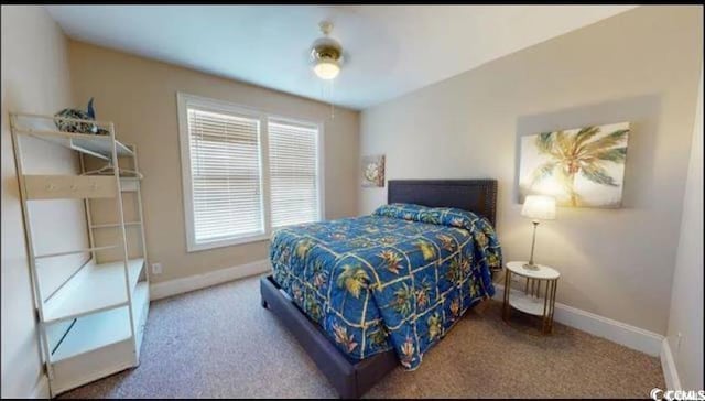 bedroom featuring carpet, baseboards, and a ceiling fan
