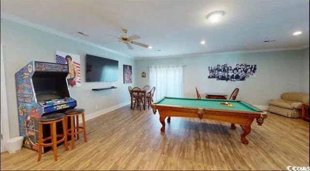 recreation room featuring light wood finished floors, baseboards, ornamental molding, and pool table