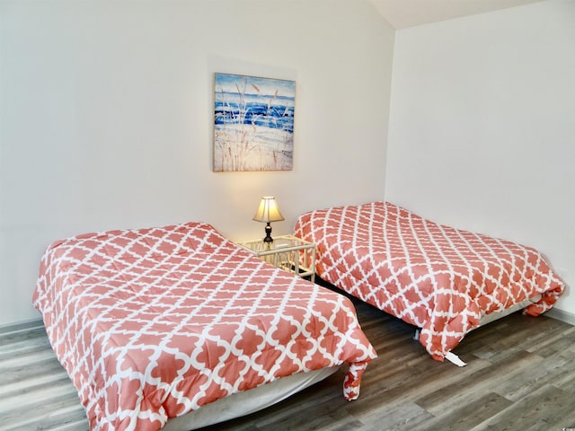 bedroom featuring hardwood / wood-style floors