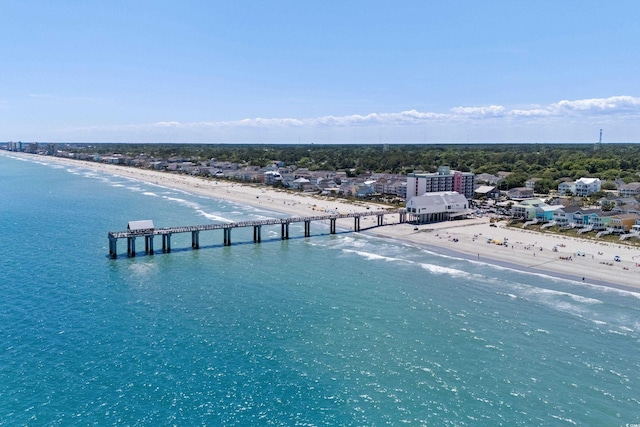 bird's eye view with a beach view and a water view