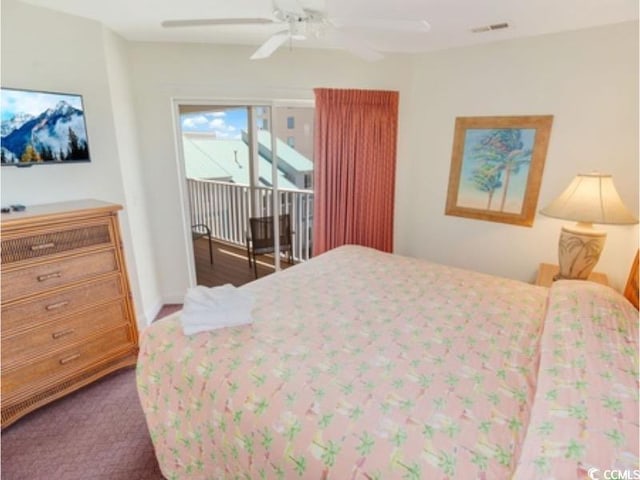 bedroom featuring access to exterior, visible vents, dark carpet, and a ceiling fan