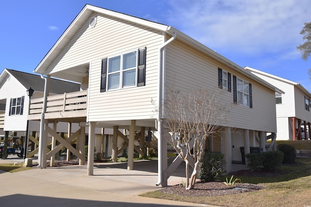 exterior space with a carport