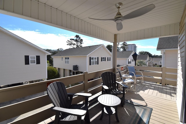 wooden terrace with ceiling fan